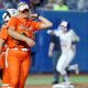 Florida outfielder Katie Kistler (29) celebrates behind Oklahoma State pitcher Lexi Kilfoyl (8) after hitting a home run in the fifth inning of a Women's College World Series softball game between the Oklahoma State Cowgirls and the Florida Gators at Devon Park in Oklahoma City, Thursday, May 30, 2024. Florida won 1-0.