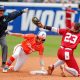 Florida outfielder Korbe Otis (33) slides into second base safe as Oklahoma second baseman Tiare Jennings (23) attempts to tag out during a Women’s College World Series semifinal game between Oklahoma (OU) and Florida at Devon Park in Oklahoma City, on Monday, June 3, 2024.