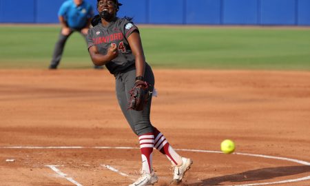 Stanford's NiJaree Canady (24) pitches during a Women's College World Series semifinal softball game between the Stanford Cardinal and the Texas Longhorns at Devon Park in Oklahoma City, Monday, June 3, 2024. Texas won 1-0.