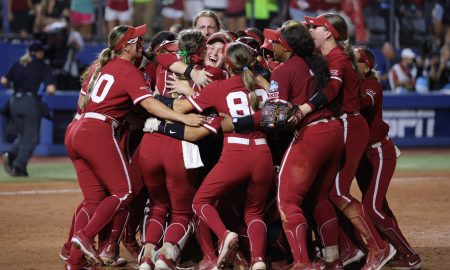 Oklahoma players celebrate after winning Game 2 of the NCAA softball Women's College World Series Championship Series game between the Oklahoma Sooners (OU) and Texas Longhorns at Devon Park in Oklahoma City, Thursday, June 6, 2024. Oklahoma won 8-4.