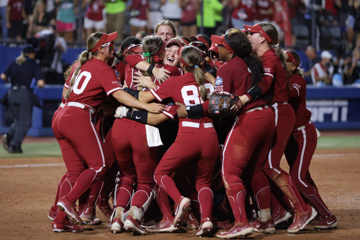 Oklahoma players celebrate after winning Game 2 of the NCAA softball Women's College World Series Championship Series game between the Oklahoma Sooners (OU) and Texas Longhorns at Devon Park in Oklahoma City, Thursday, June 6, 2024. Oklahoma won 8-4.