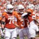 Texas Longhorns quarterback Quinn Ewers (3) and offensive lineman Hayden Conner (76) celebrate a touchdown by running back Quintrevion Wisner (26) against Colorado State at Darrell K Royal-Texas Memorial Stadium in Austin Saturday, Aug. 31, 2024.