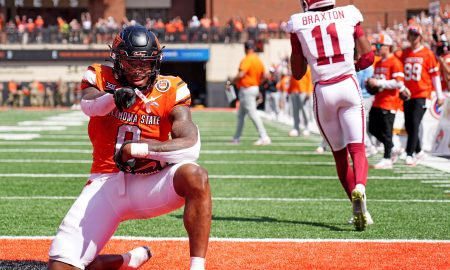 Oklahoma State's Ollie Gordon II (0) celebrates a 2-point conversion front of /tJaylon Braxton (11) in double overtime of the college football game between the Oklahoma State Cowboys and the Arkansas Razorbacks at Boone Pickens Stadium in Stillwater, Okla.,, Saturday, Sept., 7, 2024.