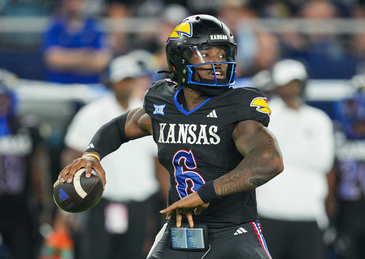 Sep 13, 2024; Kansas City, Kansas, USA; Kansas Jayhawks quarterback Jalon Daniels (6) throws a pass during the second half against the UNLV Rebels at Children's Mercy Park. Mandatory Credit: Jay Biggerstaff-Imagn Images